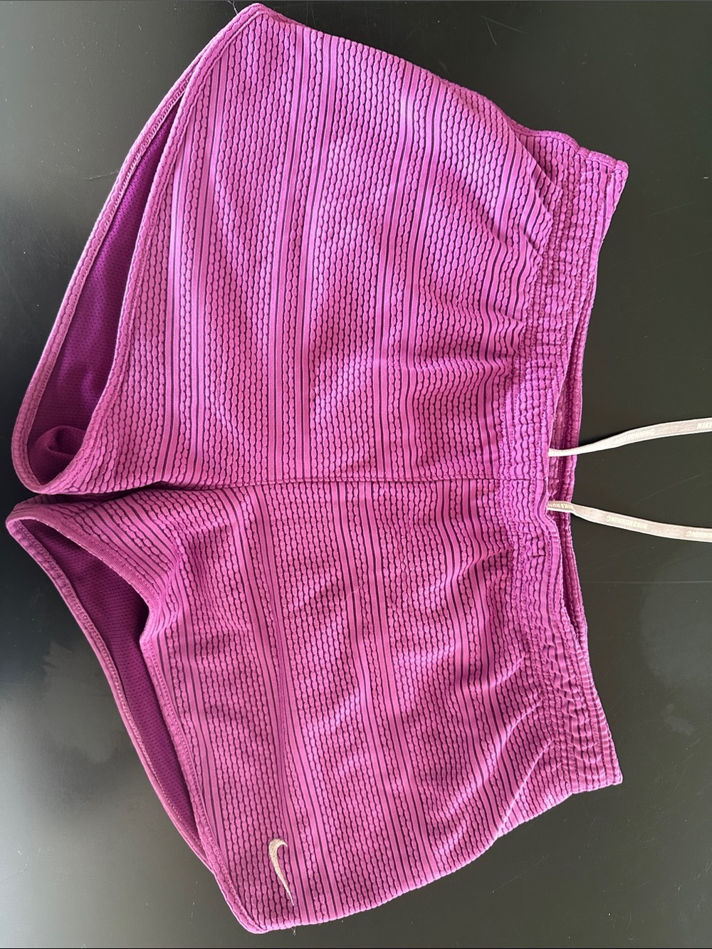 Nike Magenta Textured Athletic Shorts for Women.